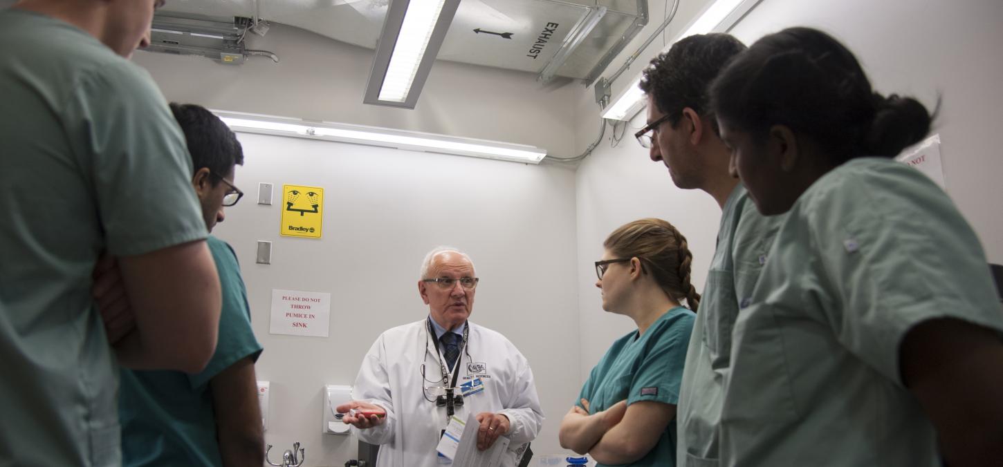 Instructor Dr. Frank Stechey with students on rotation at George Brown College