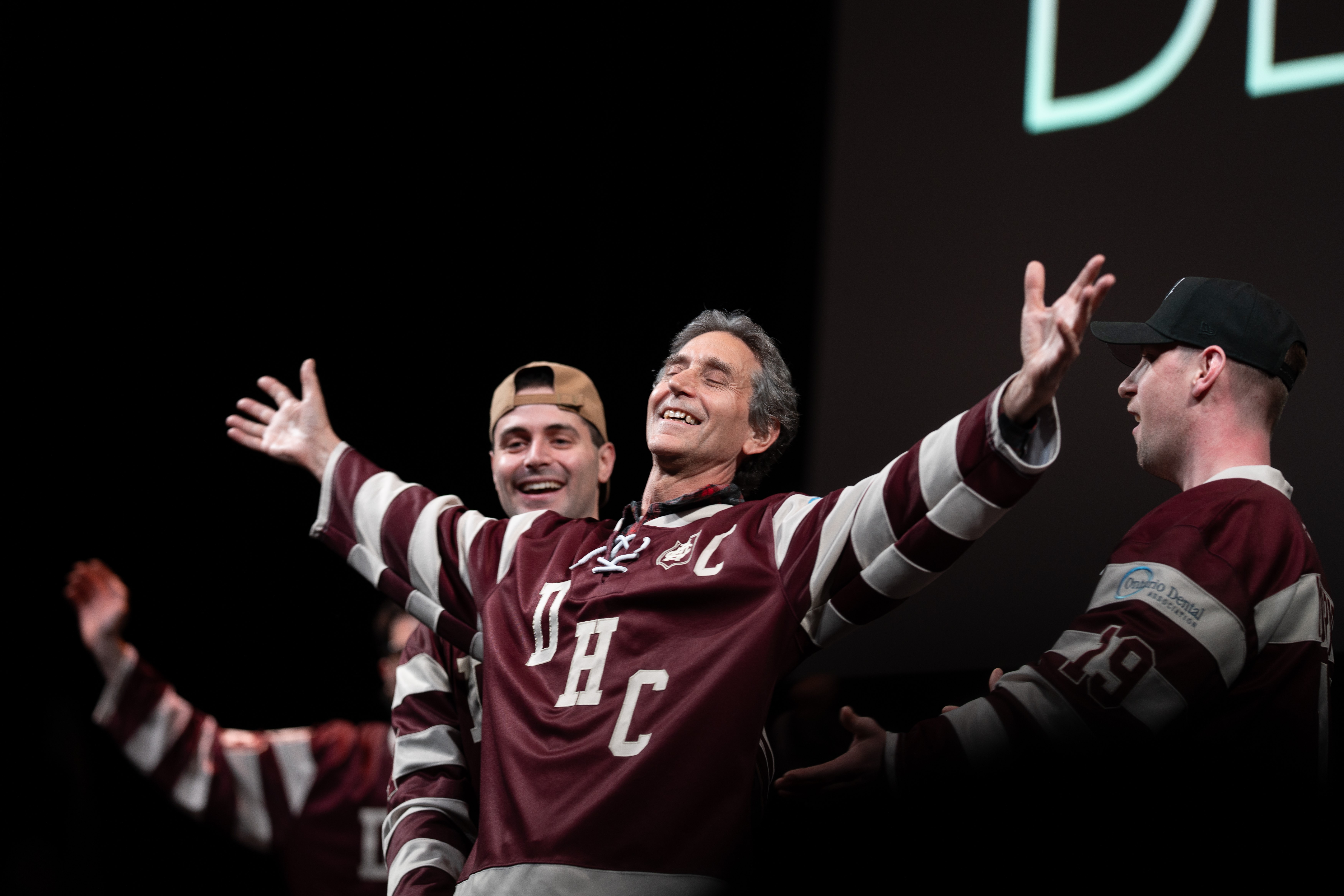 The Dental Hockey Club players make a surprise appearance with Dr. Rosenbloom in the boys’ dance (Henry Chen)