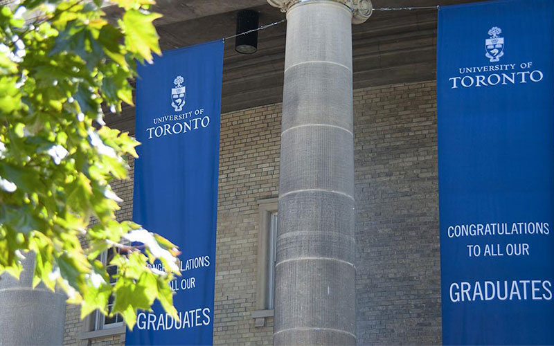 Flags celebrating graduates at the University of Toronto