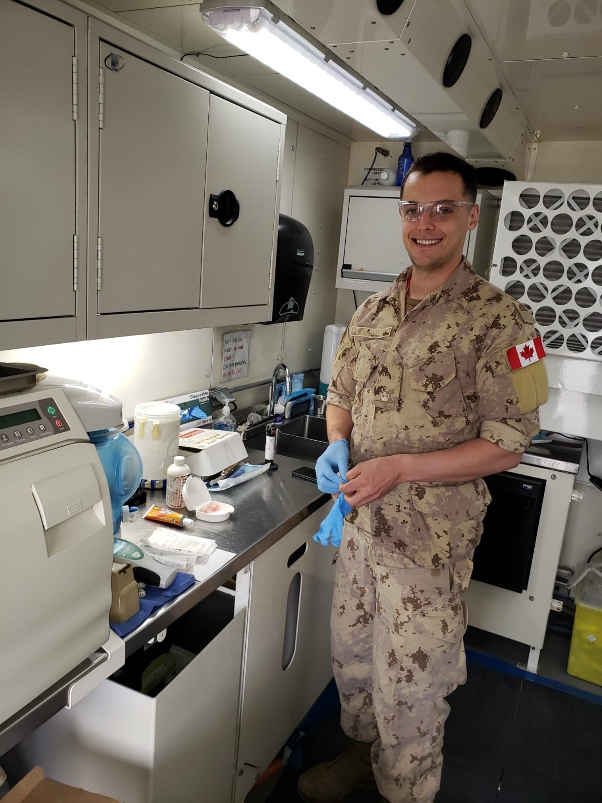 Jesse Barker in the Canadian Mobile Dental Clinic in Iraq