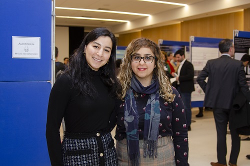 Student Research Group President Maya Ezzo (left) and Vice President Fereshteh Younesi (right).