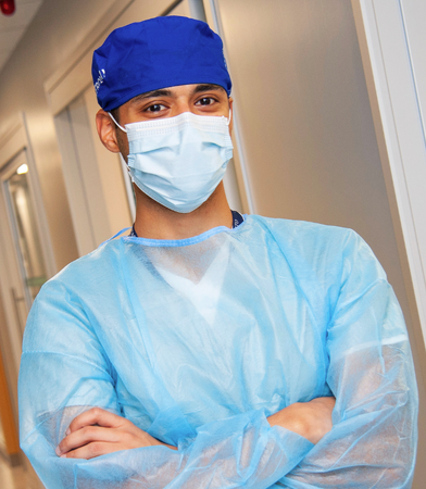 Dentistry student standing in the clinic.