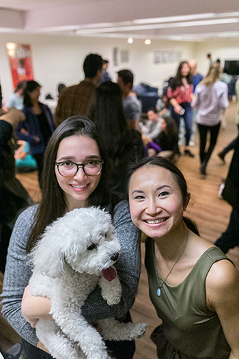 image of girls with dog