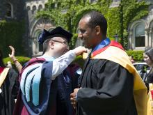 Paulos Seyoum with Dr. Jim Lai in gowns 