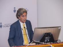 person speaking at podium