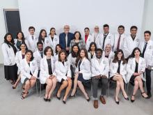 group of students in white coats