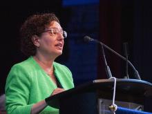 person speaking at podium
