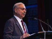 person speaking at podium