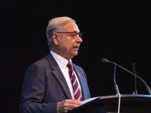 person speaking at podium