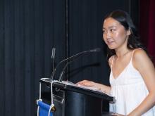 person speaking at podium
