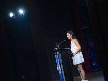 person speaking at podium