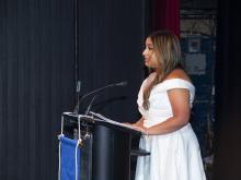 person speaking at podium