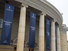 banners hanging outside convocation hall building