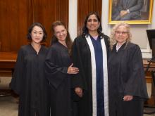 people in grad robes
