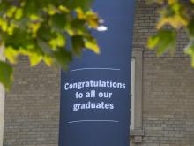 sign saying "congratulations to all our graduates"