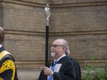 person walking in robe