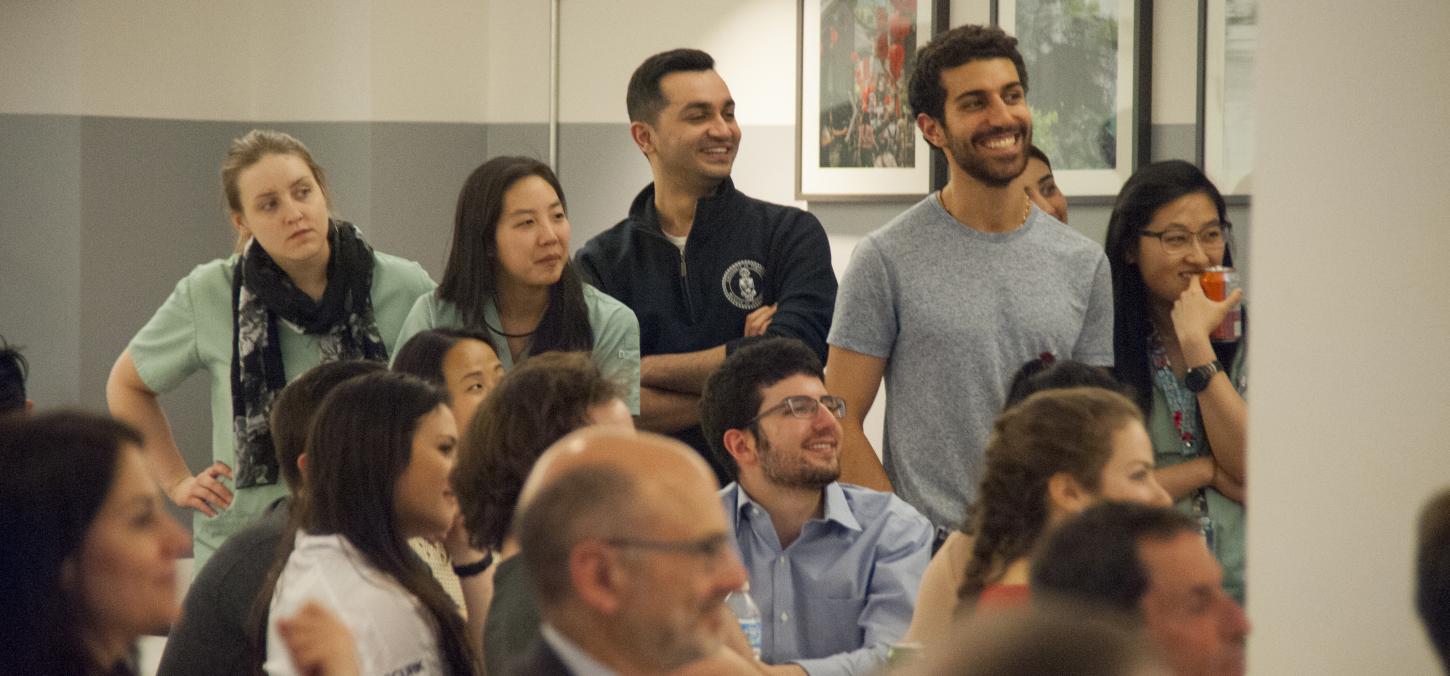 Dentistry students and faculty watch awards being handed out