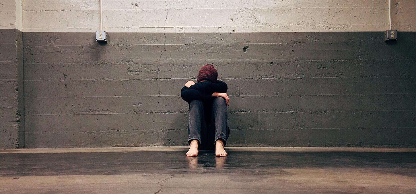 Person sitting on ground