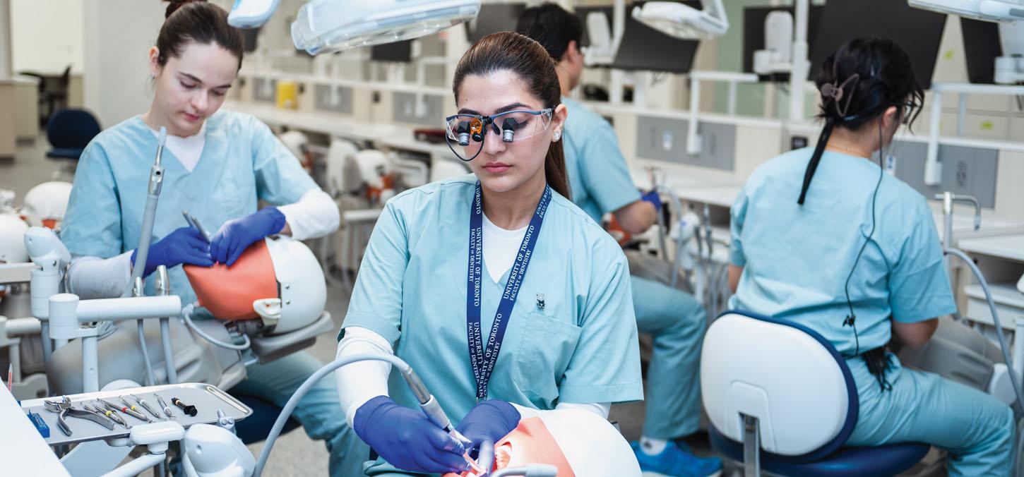 students in dental lab working on mannequins