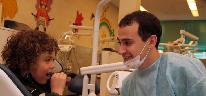 resident and patient in children's clinic