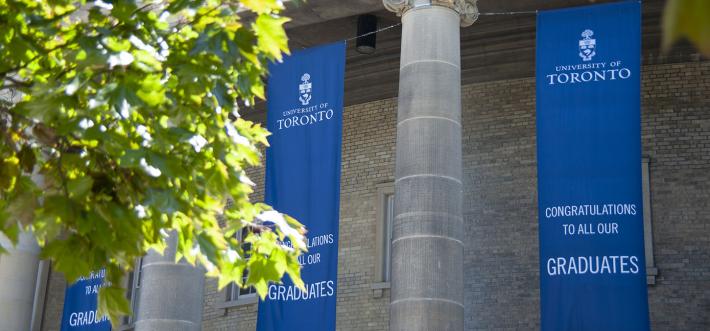 Photo of convocation banner outside of convocation hall