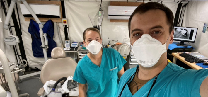 Sergeant Angela Brownell and Jesse Barker working in the Canadian Mobile Dental Clinic in Iraq 