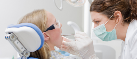 Child getting teeth examined