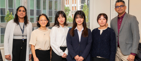 Okayama students and Faculty leadership standing together