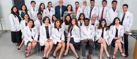 IDAPP students in white coats